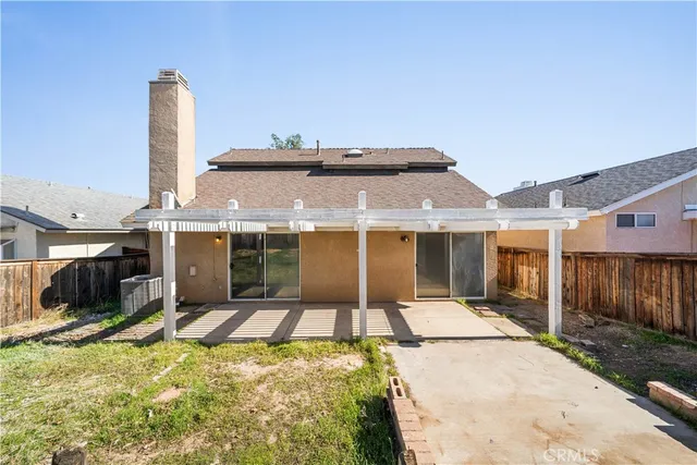 a house view with a outdoor space