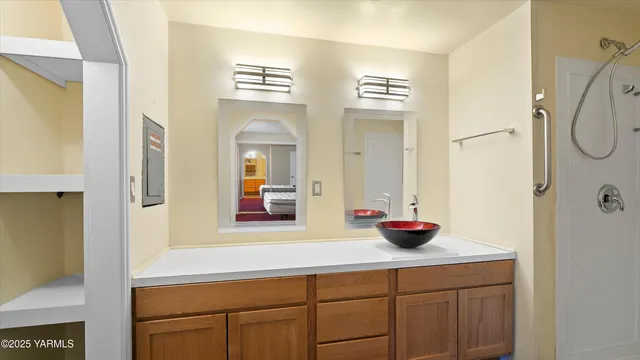 a bathroom with a sink and a mirror