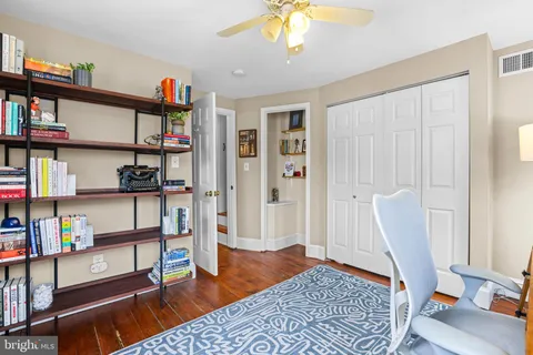 a view of a livingroom with furniture and toys
