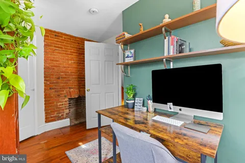 a view of a living room with furniture