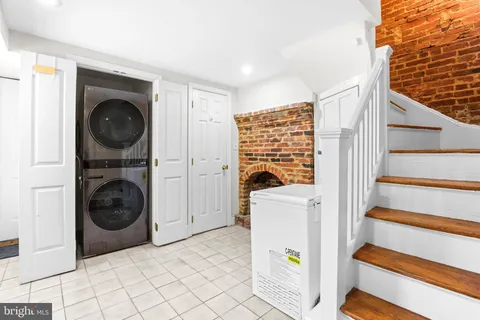 a view of washer and dryer in a utility room