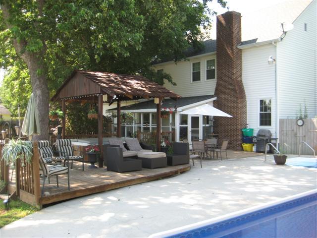 200 Jamestown Road Tullahoma, TN 37388 - Photo 19 of 20 Back of the house with views of the pool screened in back porch, gazebo and hottub.