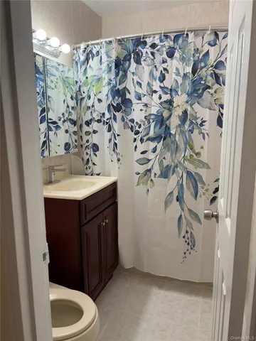 a bathroom with a sink and toilet