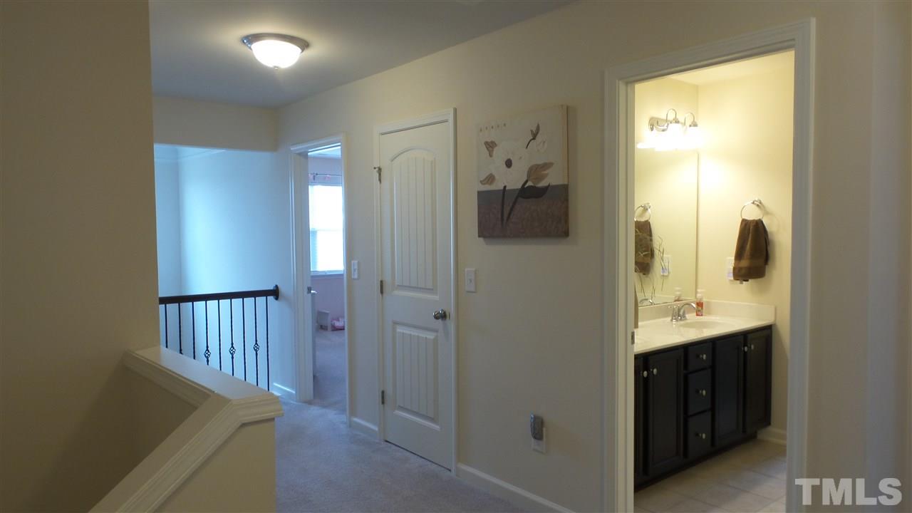 1151 Alsace Drive Apex, NC 27502 - Photo 12 of 25 Large landing as you come upstairs!