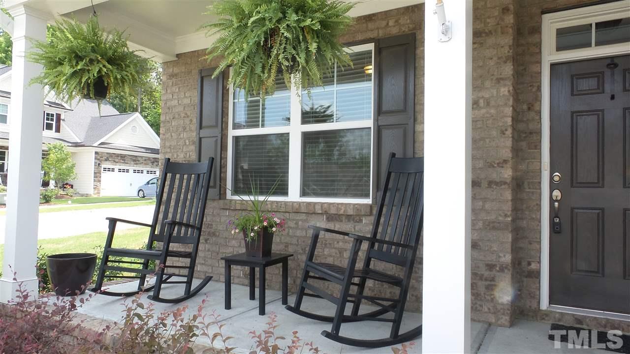 1151 Alsace Drive Apex, NC 27502 - Photo 3 of 25 Spend your evenings relaxing on this delightful Rocking Chair Front Porch!