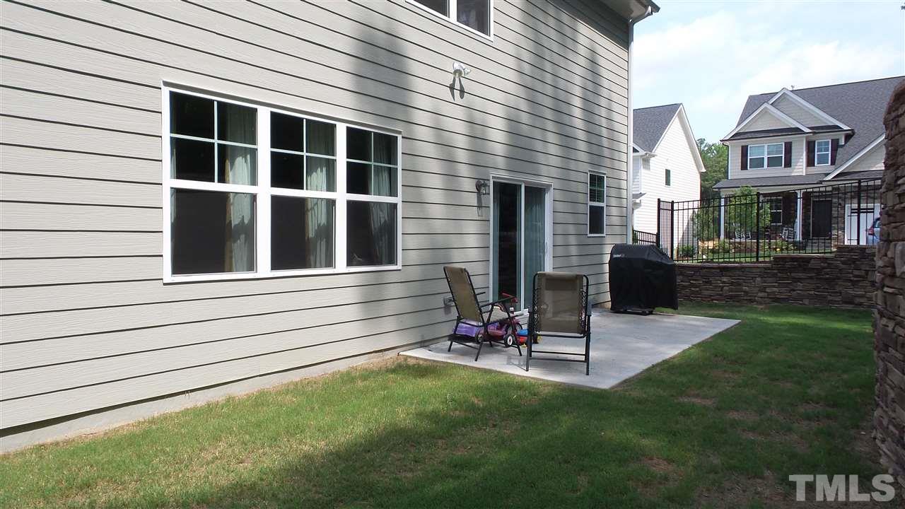 1151 Alsace Drive Apex, NC 27502 - Photo 21 of 25 Fenced backyard with patio area!