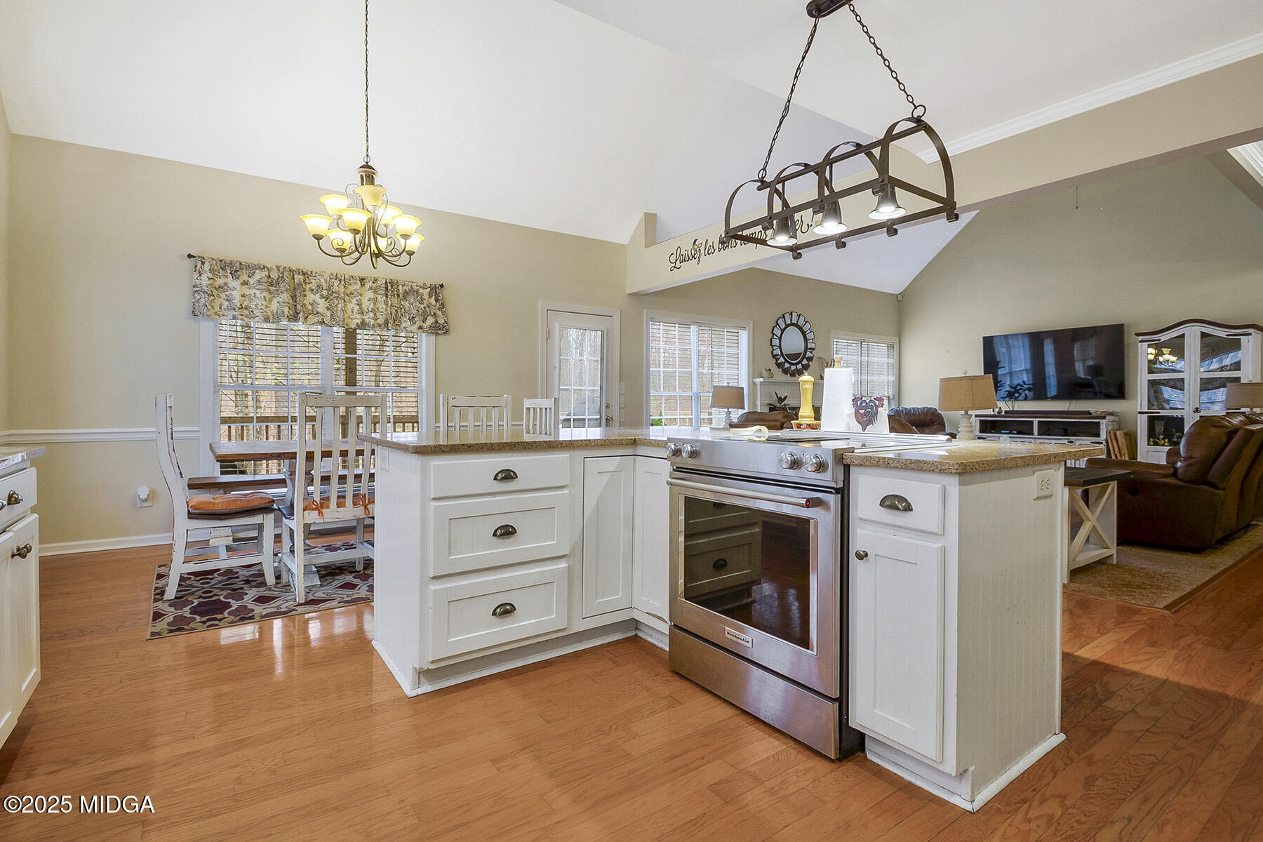 22 Rabon Drive Forsyth, GA 31029 - Photo 13 of 47 a kitchen that has a lot of cabinets and wooden floor