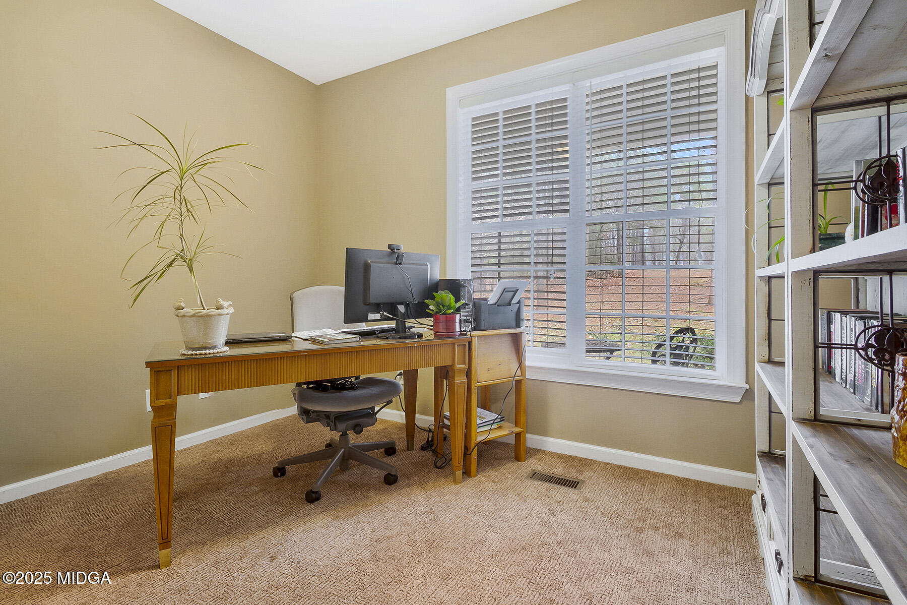 22 Rabon Drive Forsyth, GA 31029 - Photo 23 of 47 a view of a workspace with furniture and a window