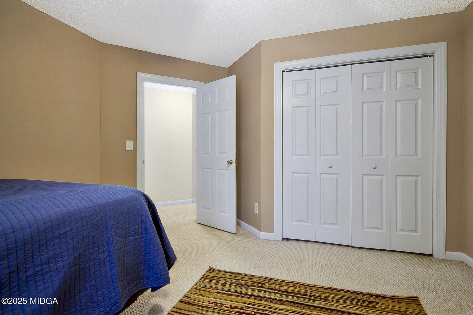 22 Rabon Drive Forsyth, GA 31029 - Photo 25 of 47 a bedroom with a bed and a dresser