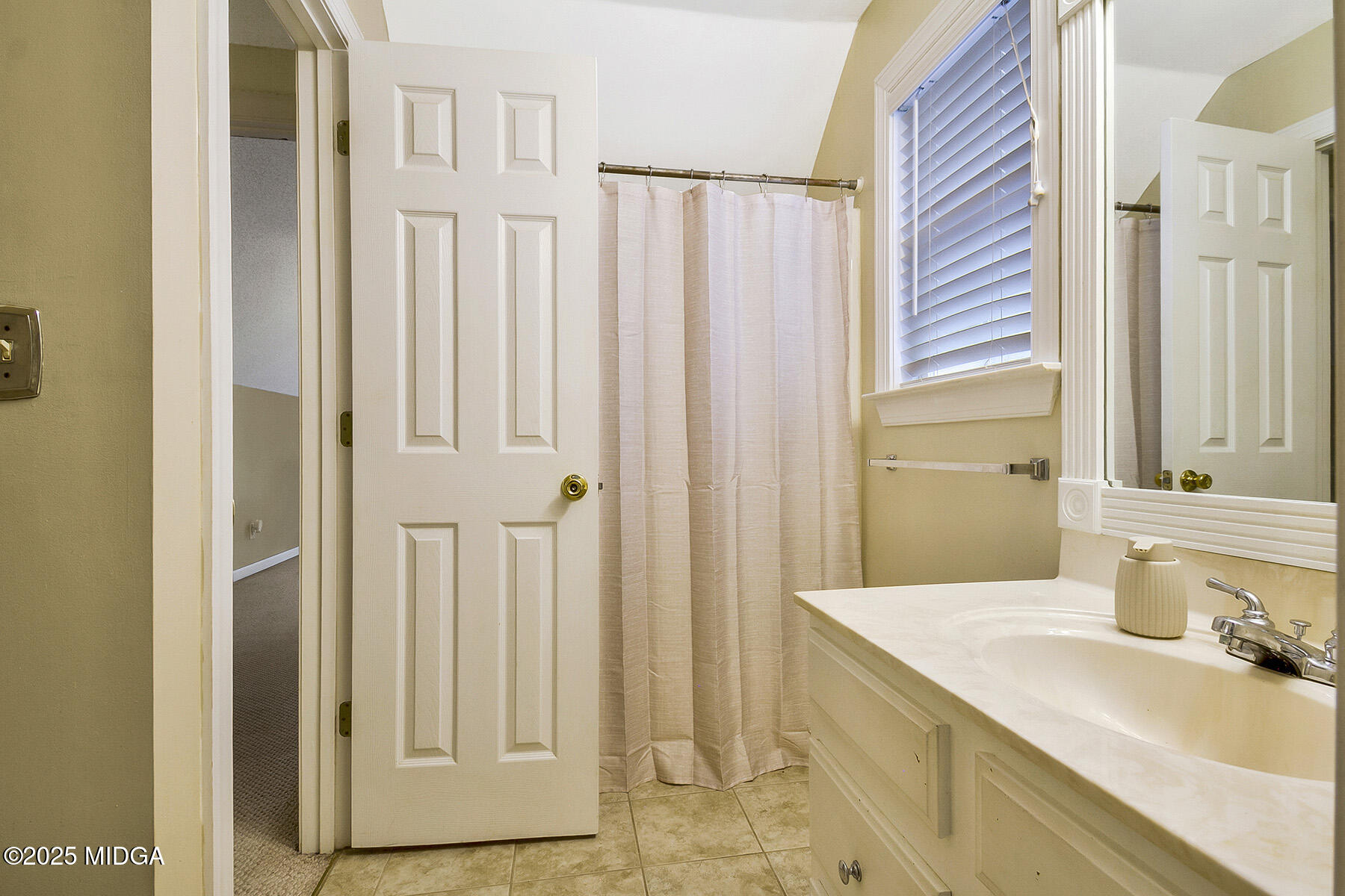 22 Rabon Drive Forsyth, GA 31029 - Photo 28 of 47 a bathroom with a sink and a mirror