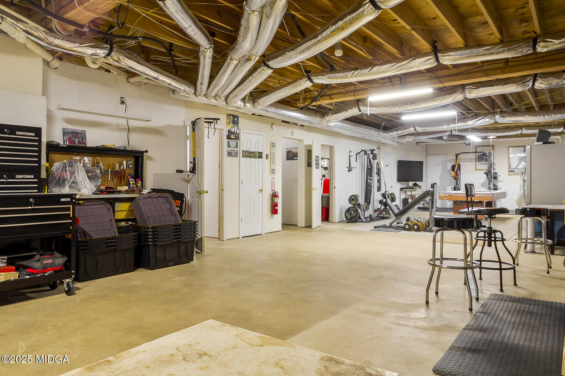 22 Rabon Drive Forsyth, GA 31029 - Photo 36 of 47 a view of a room with gym equipment