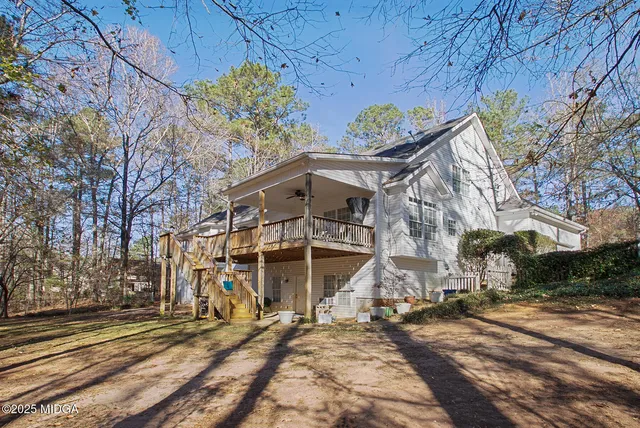 a view of a town with large trees