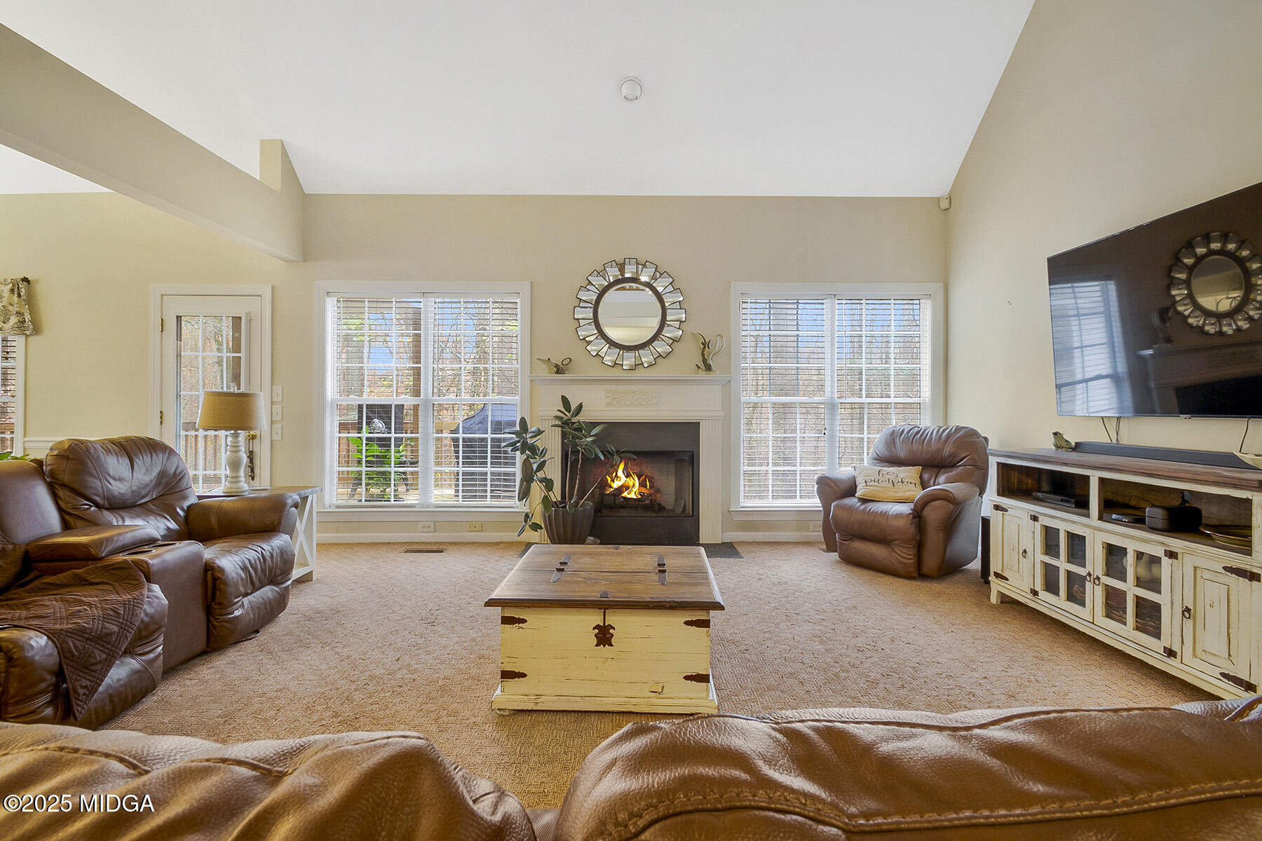 22 Rabon Drive Forsyth, GA 31029 - Photo 6 of 47 a living room with furniture and a fireplace