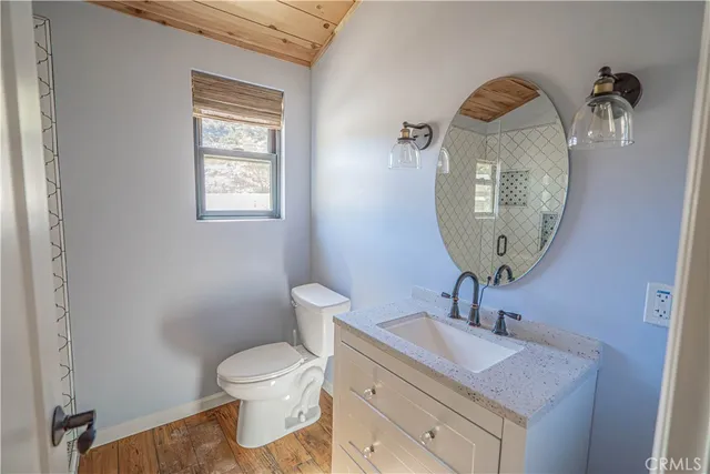 a view of a beach with a mountain in the background
