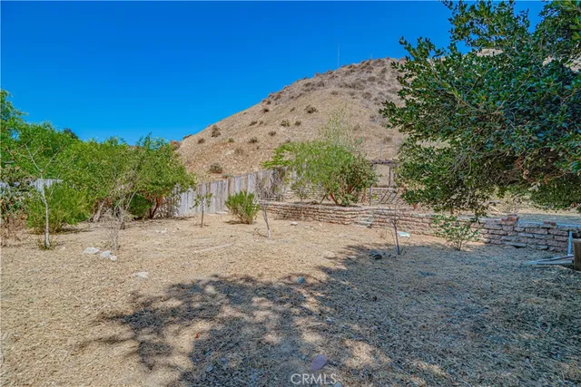 a view of a road with a building in the background