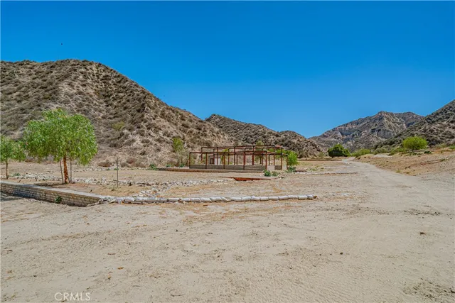 a view of a road with a building in the background
