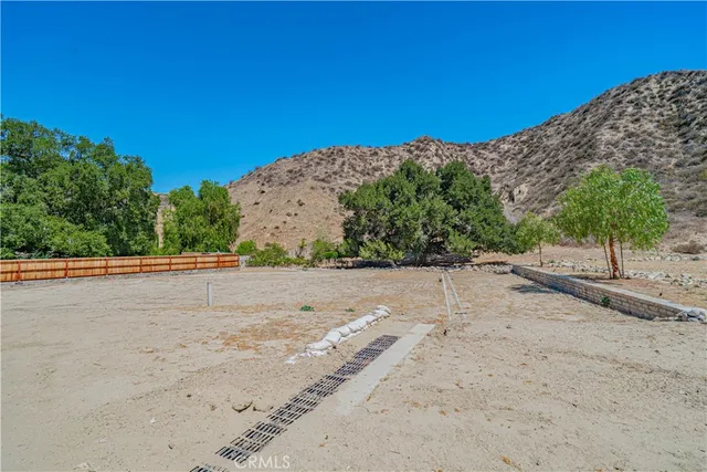 a view of a road with a mountain in the background