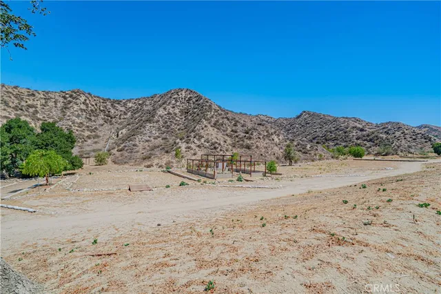 a view of a road with a building in the background