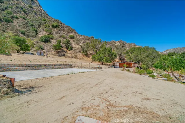 a view of a road with a mountain in the background