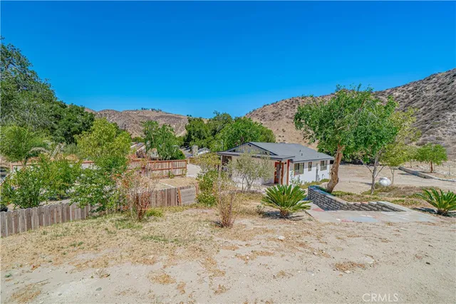 a view of a road with a yard