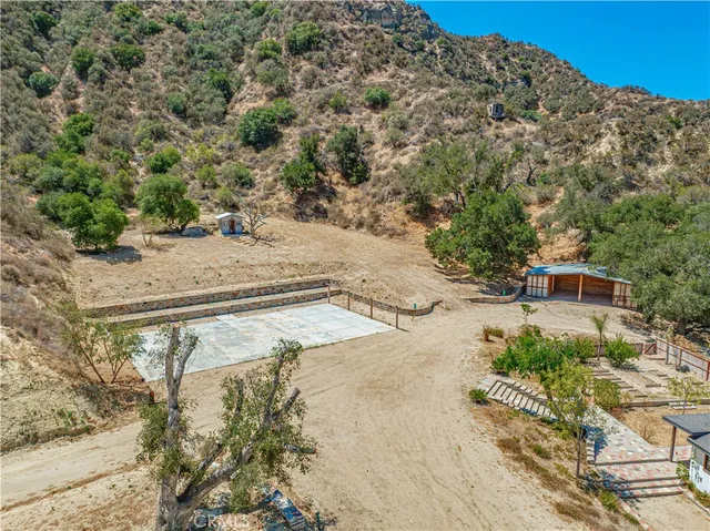 a view of a swimming pool with a yard