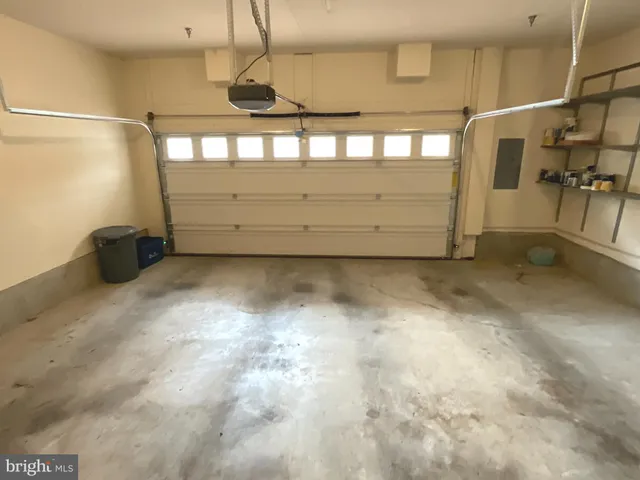 a front view of a building with a lot of windows