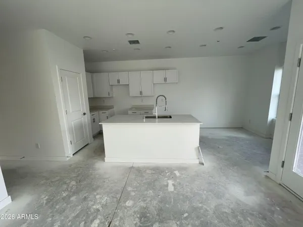 a view of a kitchen with a sink