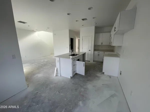 a room with cabinets and furniture