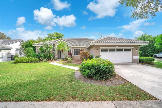 $825,000 | 9690 Northwest 39th Street, Cooper City, FL 33024