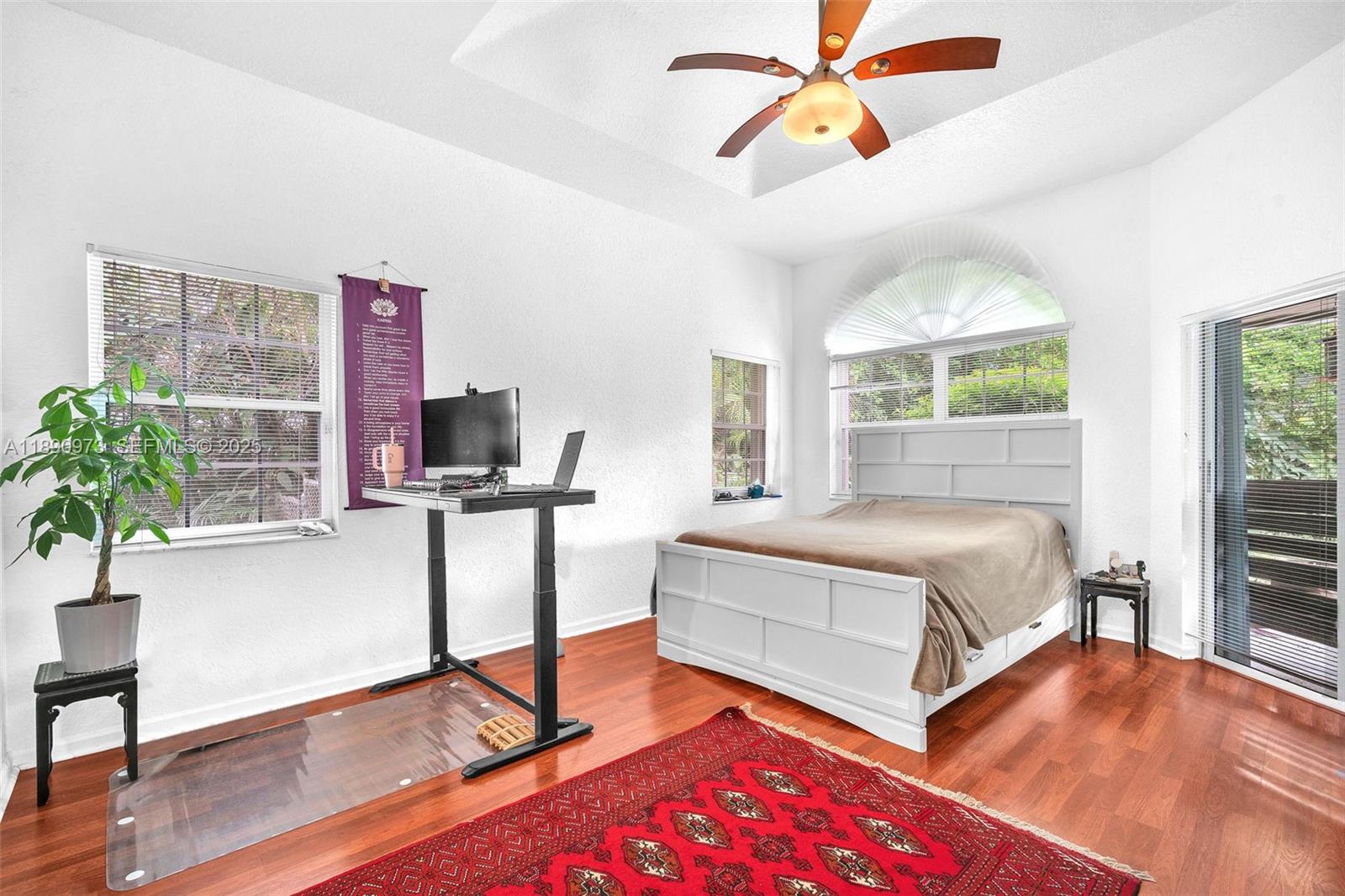 9690 Northwest 39th Street Cooper City, FL 33024 - Photo 15 of 30 a bedroom with a bed and a window