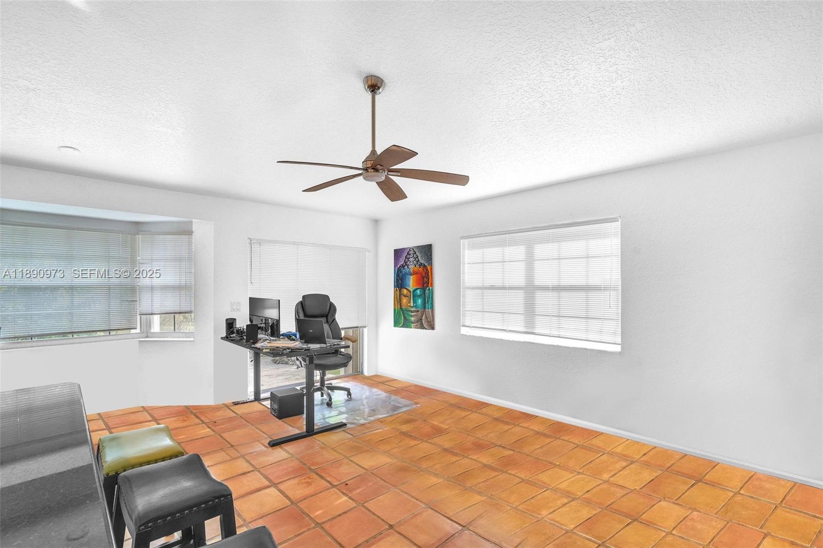 9690 Northwest 39th Street Cooper City, FL 33024 - Photo 19 of 30 a workspace with furniture and a window