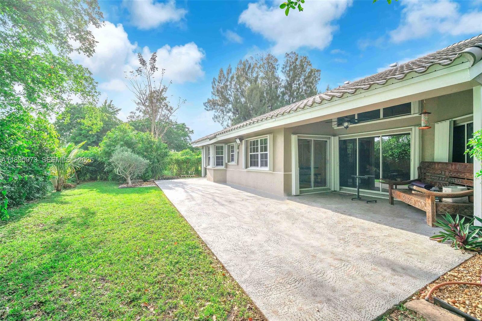 9690 Northwest 39th Street Cooper City, FL 33024 - Photo 29 of 30 a view of a house with backyard and porch