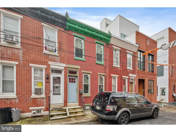 a car parked in front of a building