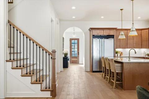 a bathroom with a sink double vanity and a mirror
