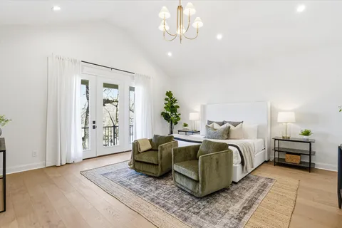 a bathroom with a double vanity sink and mirror
