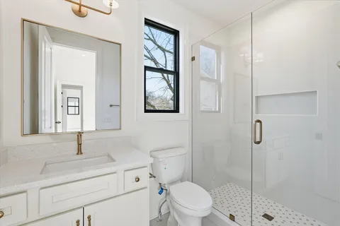 a view of a balcony with wooden floor