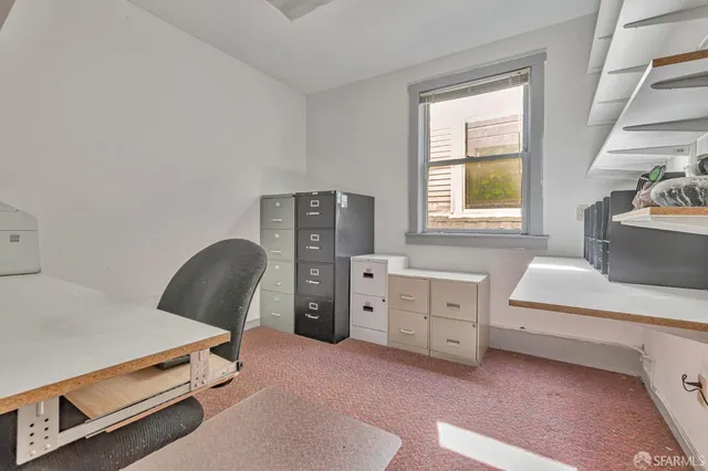 a storage room with washer and dryer