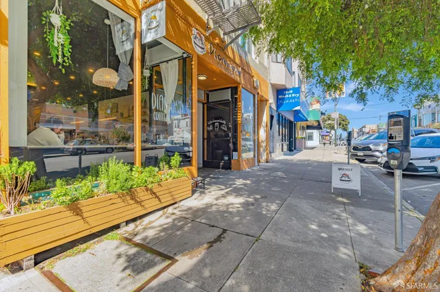 a view of a street with sitting area
