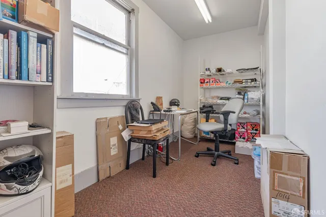 a bathroom with a sink toilet and vanity