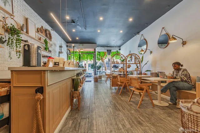 a view of a living room and dining room