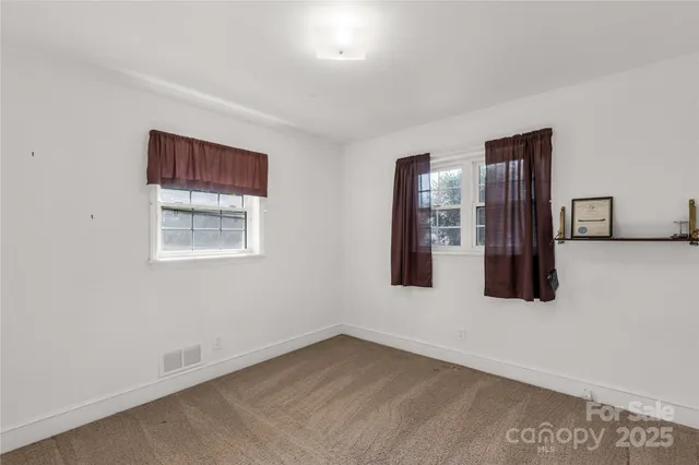 a view of an empty room with window