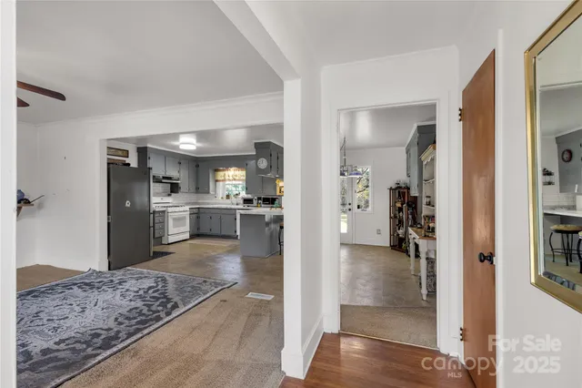 a view of a kitchen and living room