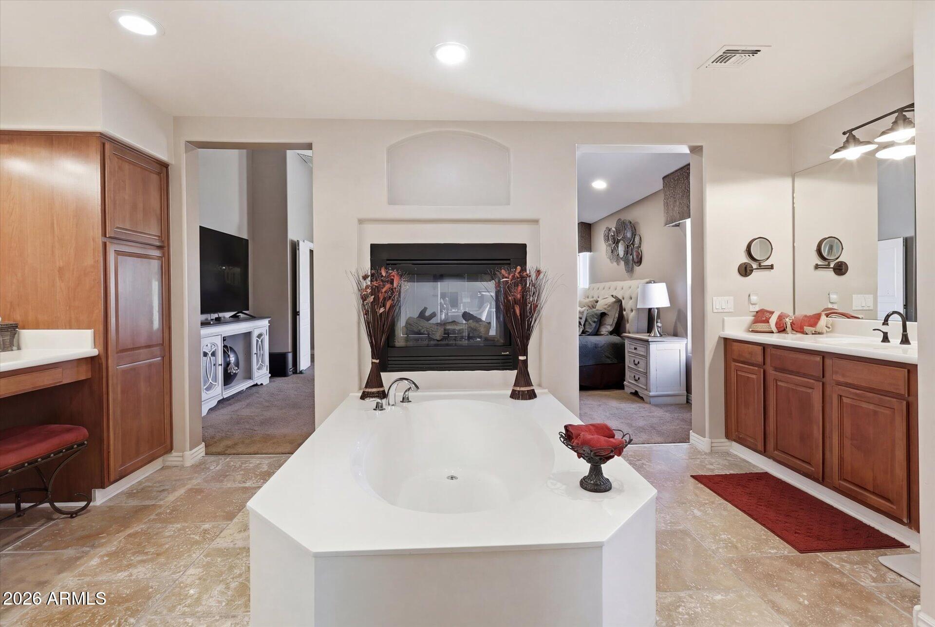 2324 West Zenith Lane Phoenix, AZ 85085 - Photo 43 of 85 Primary Bath Soaking Tub & Fireplace