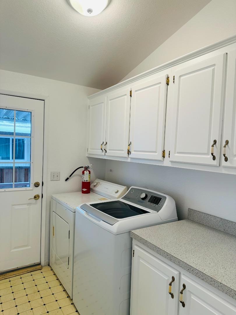 200 Ford Road, Unit 227 San Jose, CA 95138 - Photo 12 of 27 a kitchen with a sink a stove and cabinets