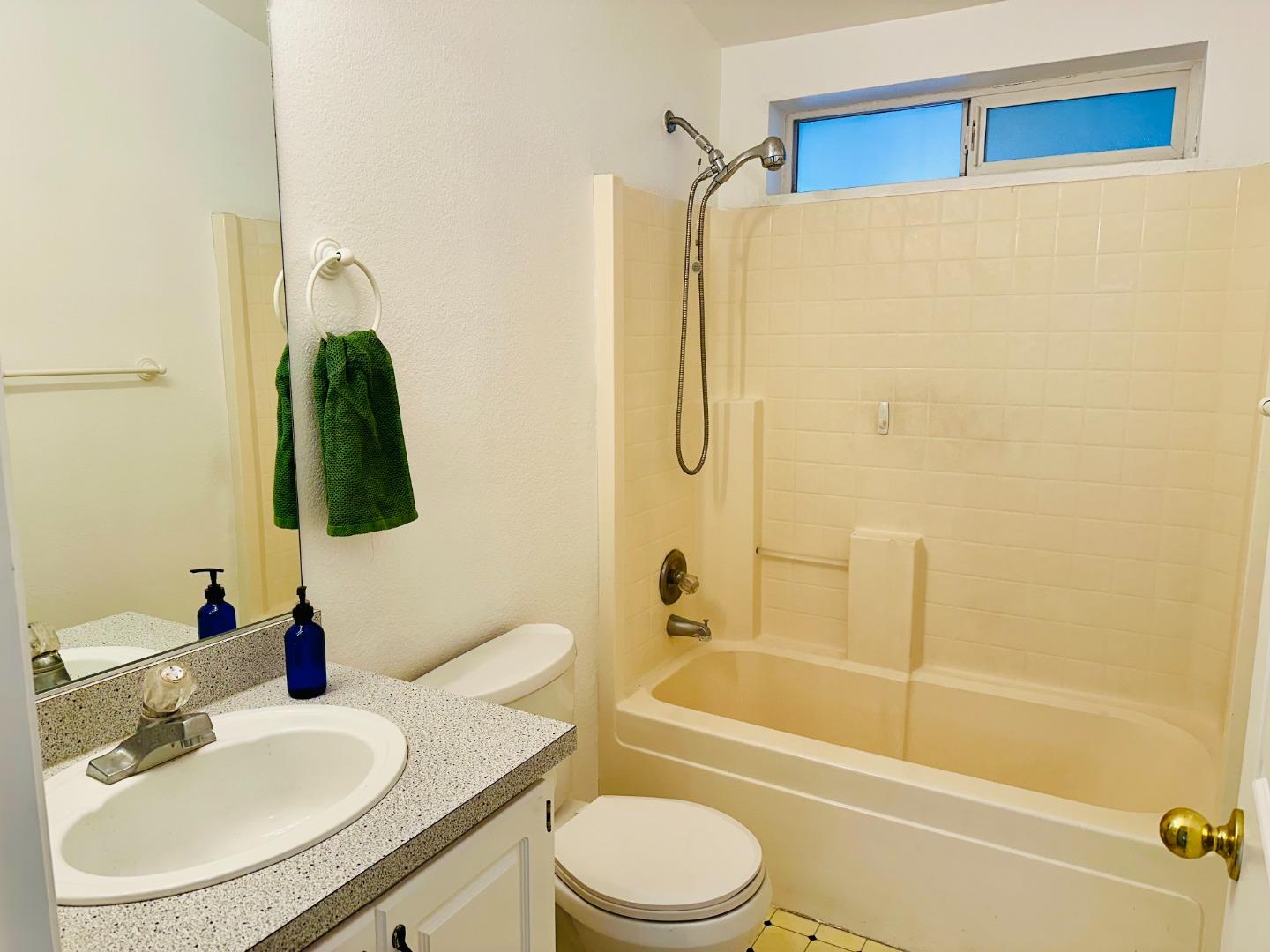 200 Ford Road, Unit 227 San Jose, CA 95138 - Photo 14 of 27 a bathroom with a sink toilet and shower