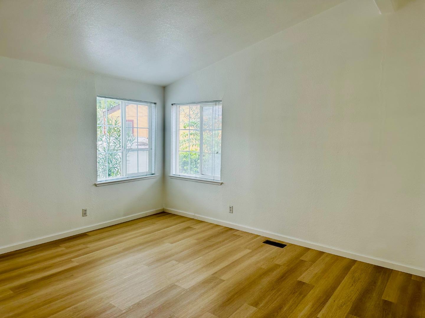 200 Ford Road, Unit 227 San Jose, CA 95138 - Photo 17 of 27 an empty room with windows