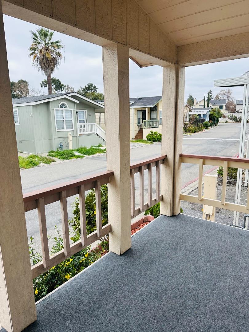 200 Ford Road, Unit 227 San Jose, CA 95138 - Photo 3 of 27 a front view of a house with a garden