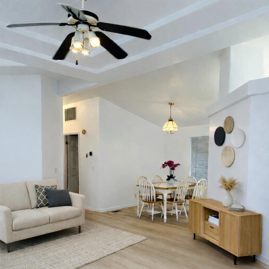 200 Ford Road, Unit 227 San Jose, CA 95138 - Photo 4 of 27 a living room with furniture and flowers