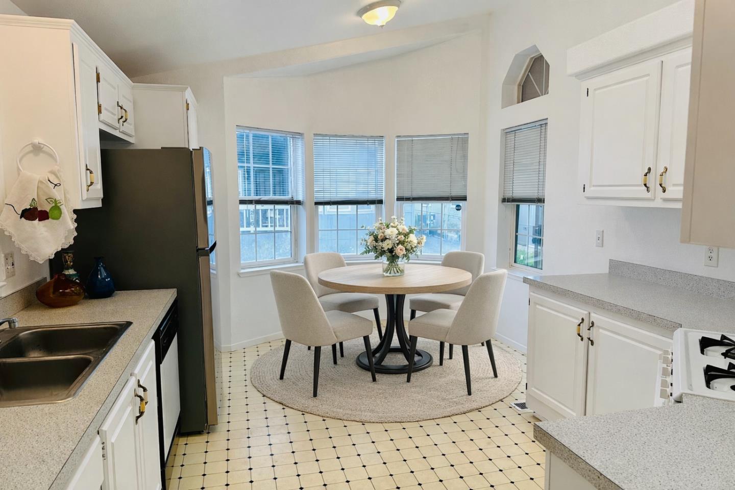 200 Ford Road, Unit 227 San Jose, CA 95138 - Photo 6 of 27 a view of a dining room with furniture