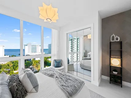 a bedroom with a bed and a walk in closet